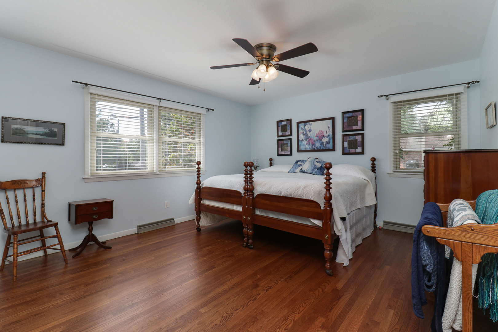 502 Jersey Avenue Normal, IL 61761 - Photo 18 of 46 a bedroom with a bed and wooden floor
