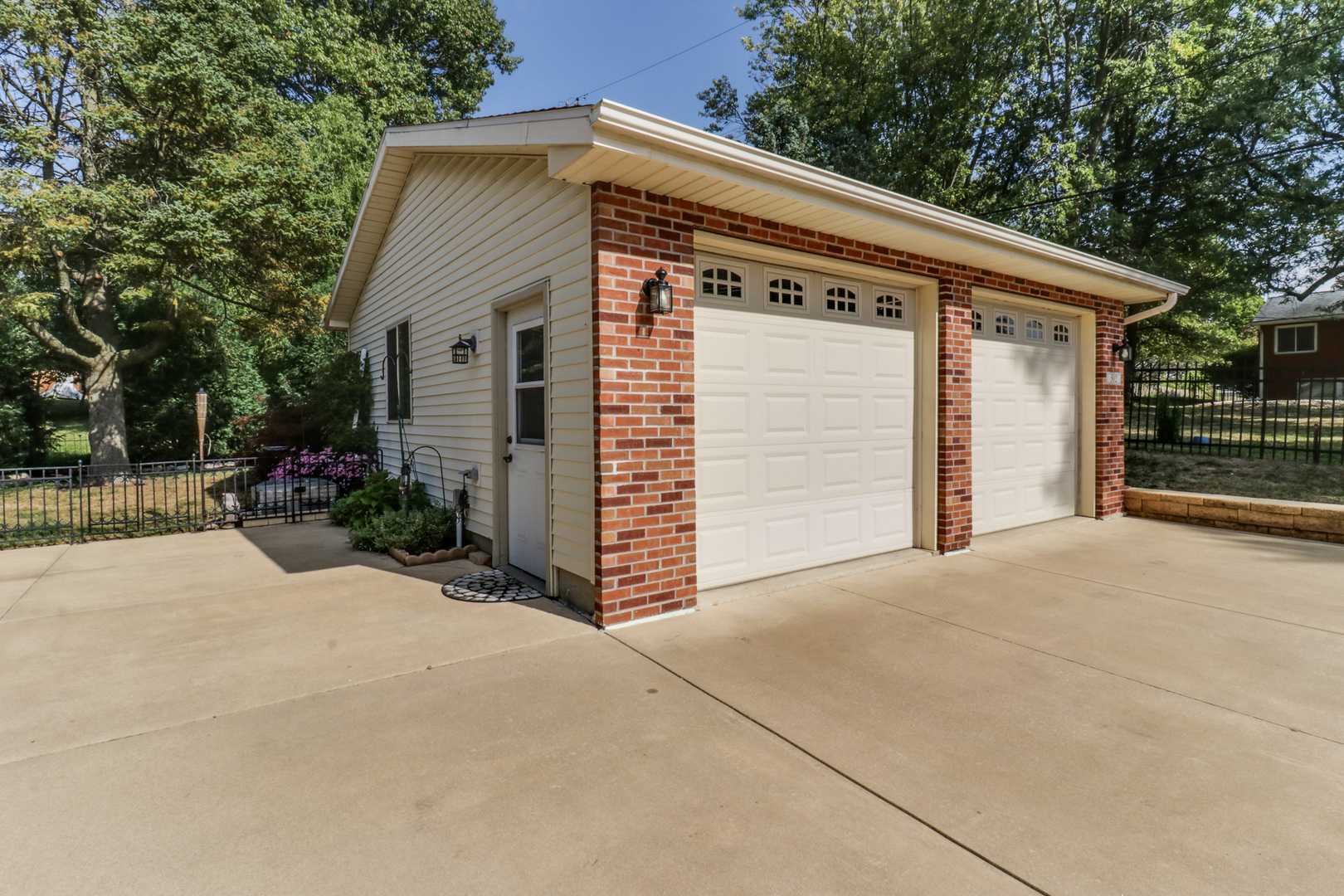 502 Jersey Avenue Normal, IL 61761 - Photo 25 of 46 a backyard of a house with plants and a tree