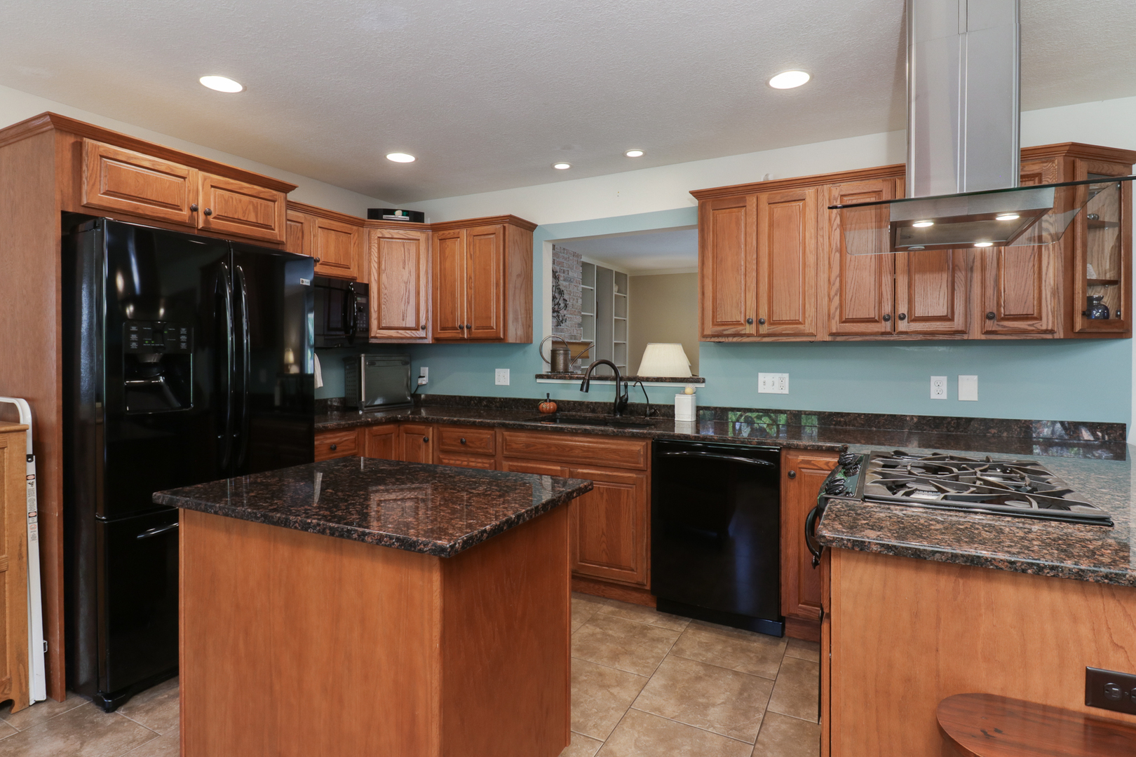 502 Jersey Avenue Normal, IL 61761 - Photo 5 of 46 a kitchen with stainless steel appliances granite countertop a stove a sink and a refrigerator