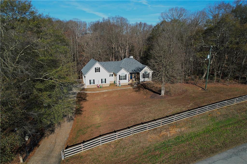 a view of a house with a street