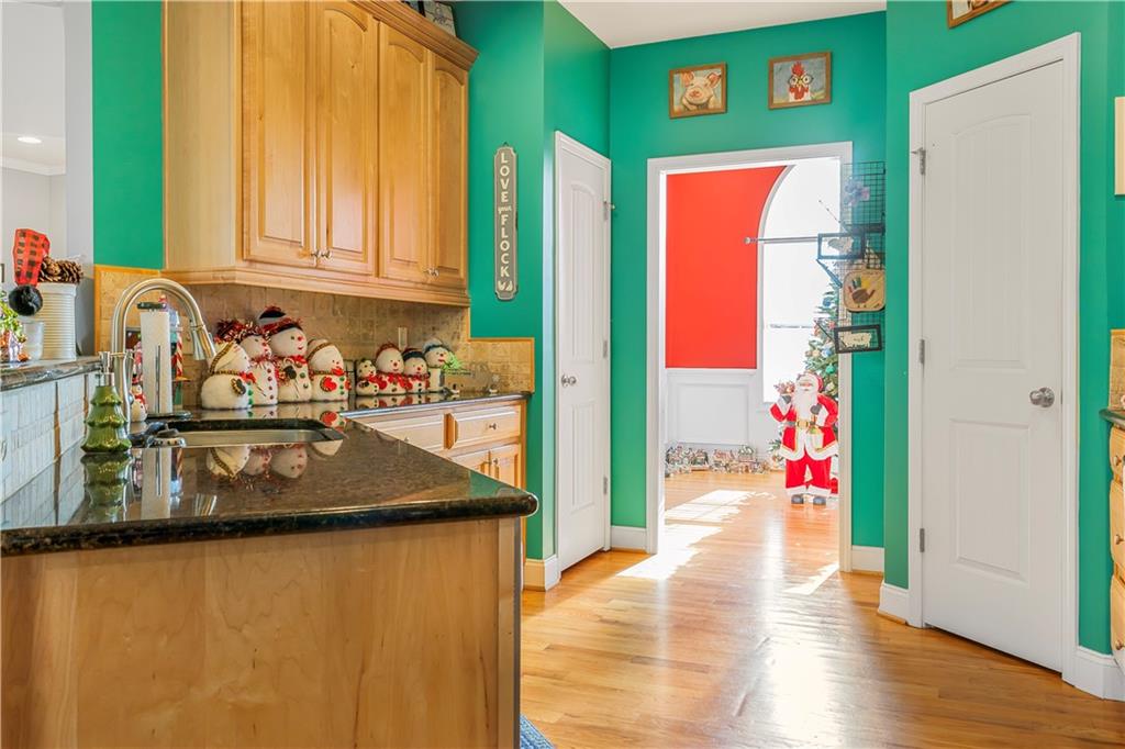 235 Brooks Road Pendergrass, GA 30567 - Photo 11 of 33 a kitchen with stainless steel appliances granite countertop a refrigerator and a sink