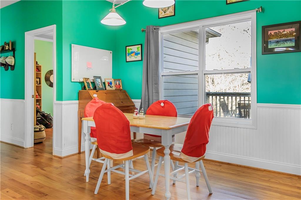 235 Brooks Road Pendergrass, GA 30567 - Photo 13 of 33 a view of a dining room with furniture and wooden floor