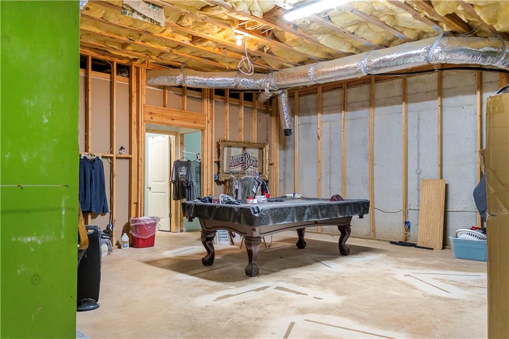 235 Brooks Road Pendergrass, GA 30567 - Photo 27 of 33 a view of a chairs and tables in the patio