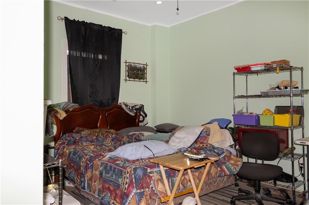 235 Brooks Road Pendergrass, GA 30567 - Photo 28 of 33 a bed room with two beds and a chair