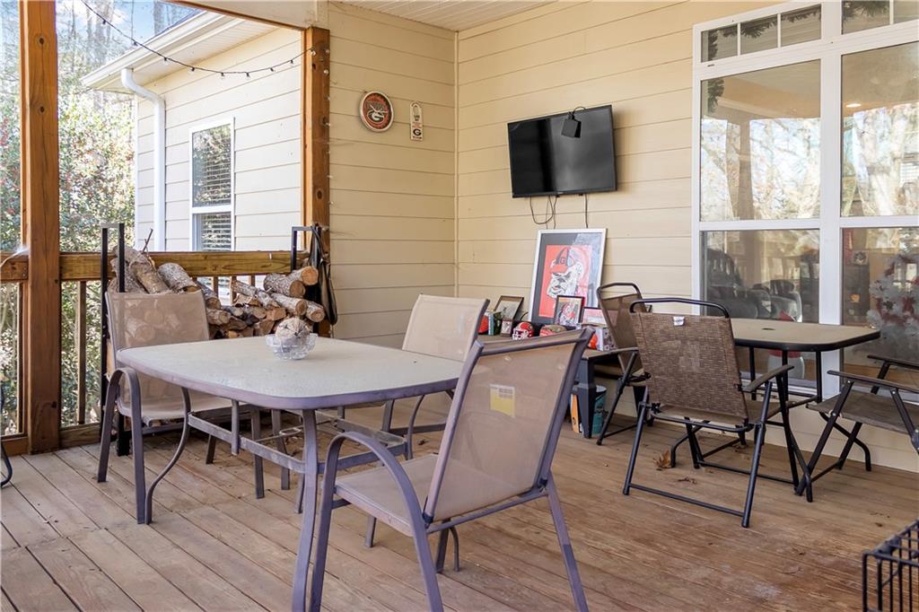 235 Brooks Road Pendergrass, GA 30567 - Photo 30 of 33 a view of a dining room with furniture and window