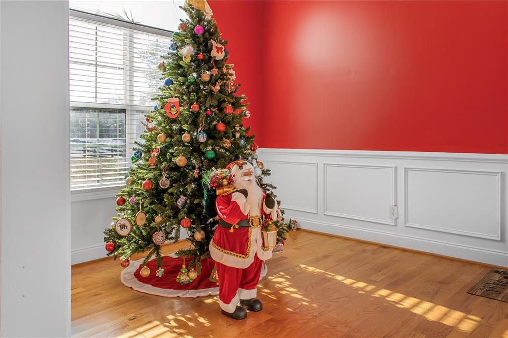 235 Brooks Road Pendergrass, GA 30567 - Photo 7 of 33 a dining room with furniture and a potted plant