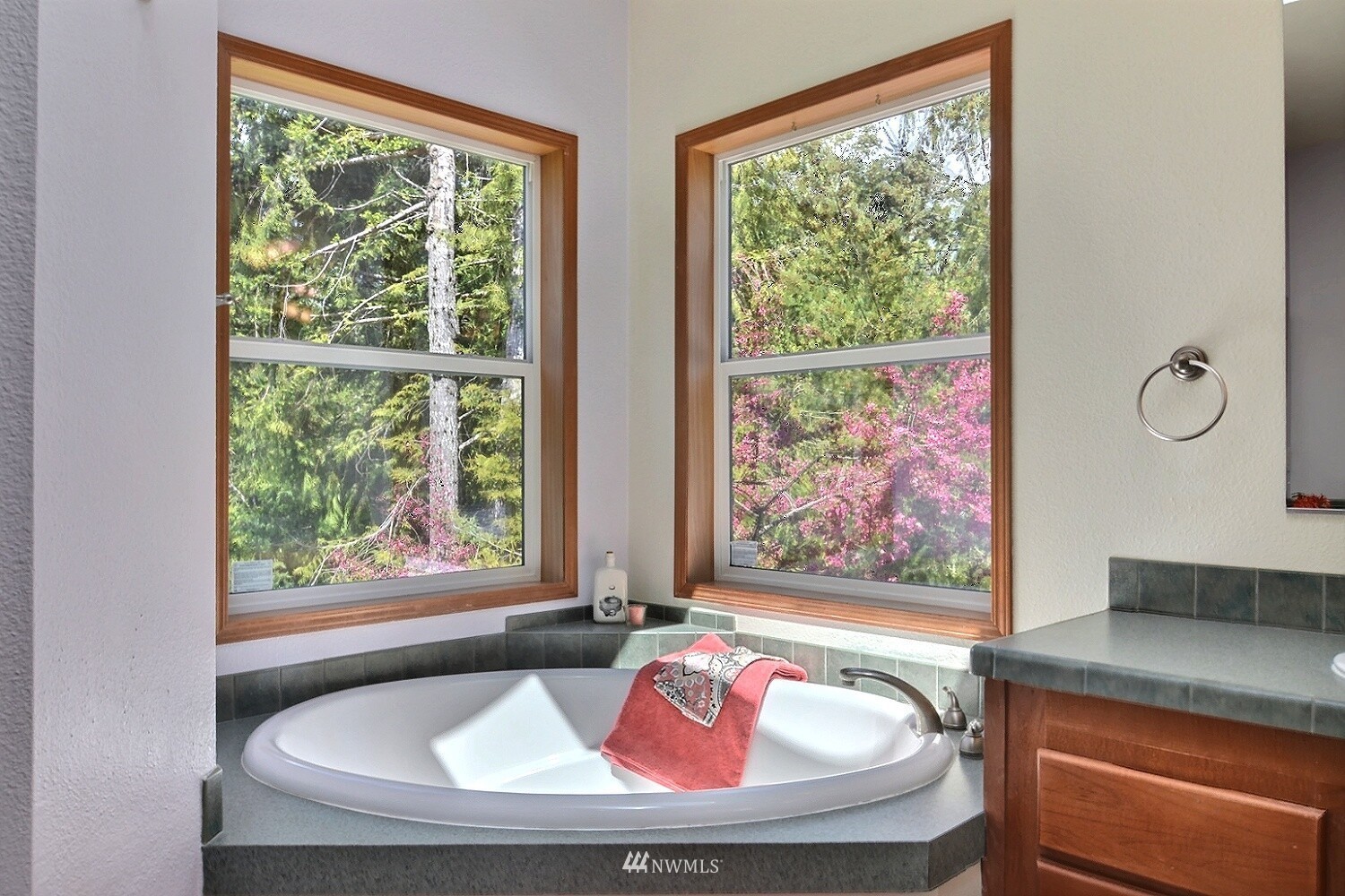 4704 Whiteman Road Southwest Longbranch, WA 98351 - Photo 16 of 40 a view of a dining room with furniture large window and outside view