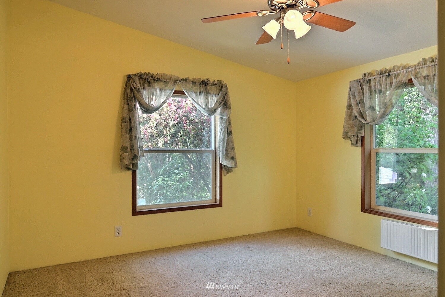 4704 Whiteman Road Southwest Longbranch, WA 98351 - Photo 18 of 40 an empty room with a window