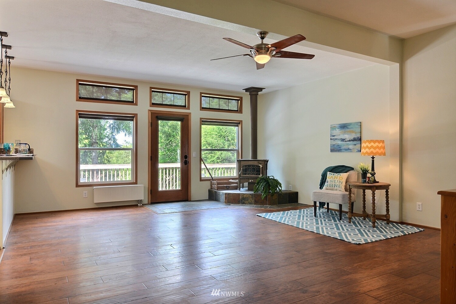 4704 Whiteman Road Southwest Longbranch, WA 98351 - Photo 2 of 40 a view of a livingroom with furniture hardwood floor and workspace