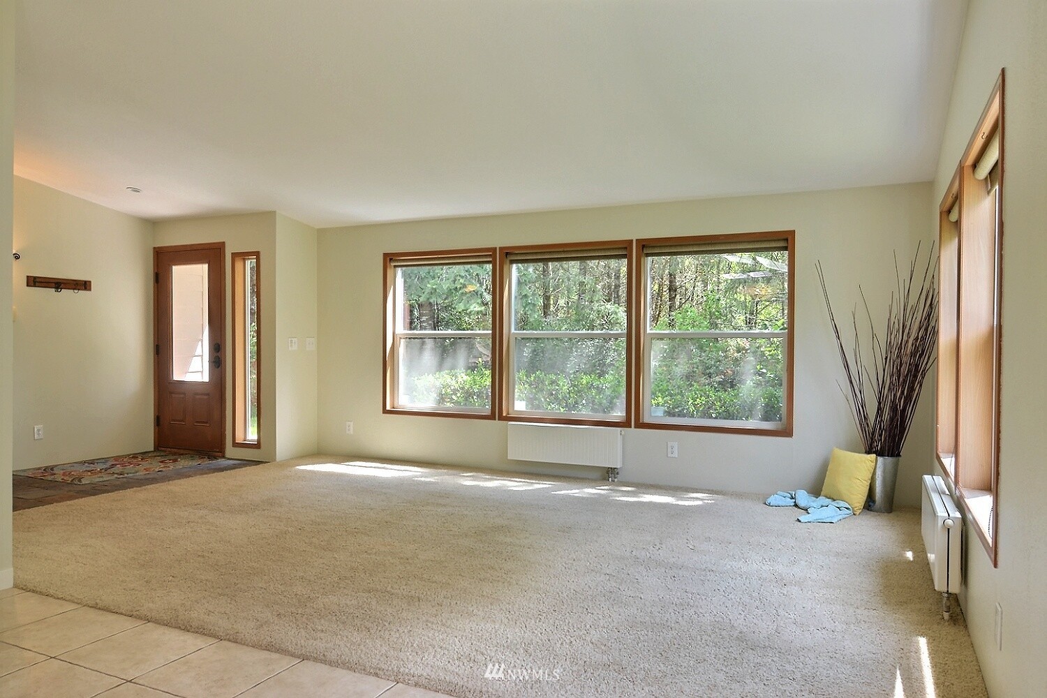 4704 Whiteman Road Southwest Longbranch, WA 98351 - Photo 3 of 40 a view of an empty room with a window
