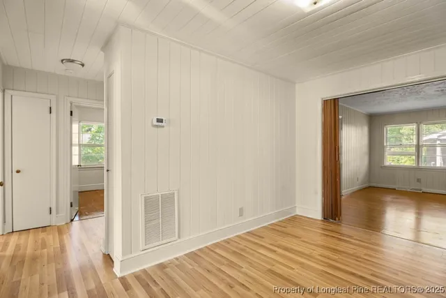 a view of wooden floor in an empty room
