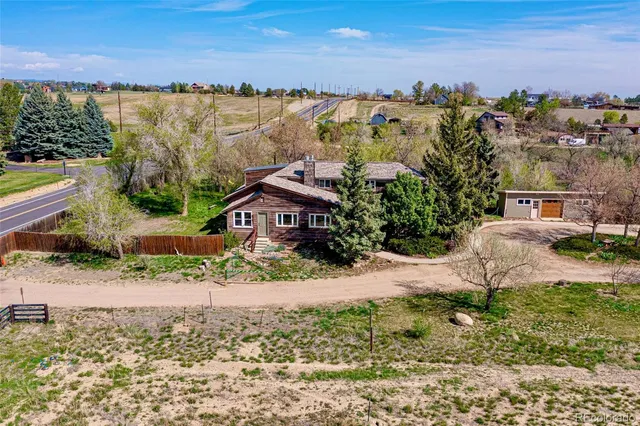 a view of houses with outdoor space and city view