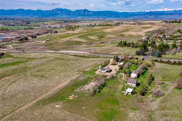 a view of an ocean and a mountain