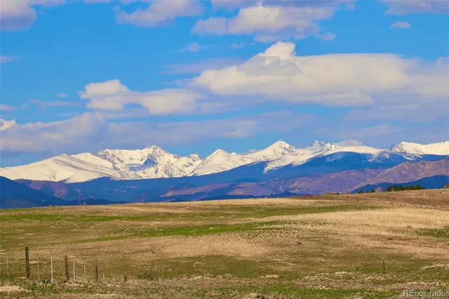 a view of ocean with sunset