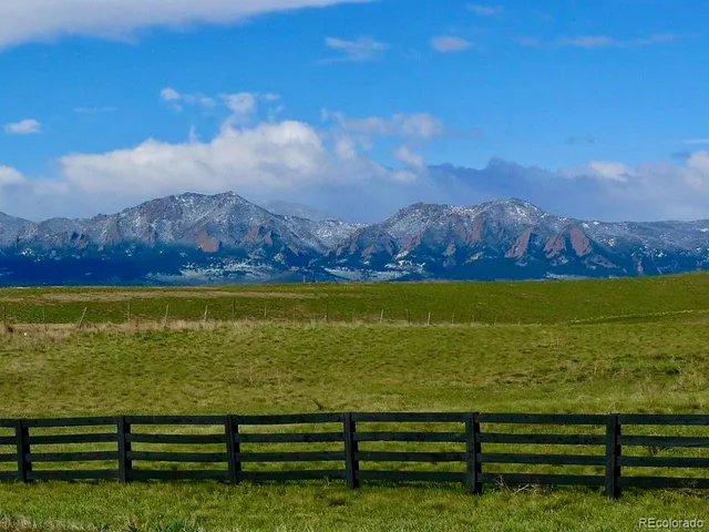 a view of a lake with a mountain in the background