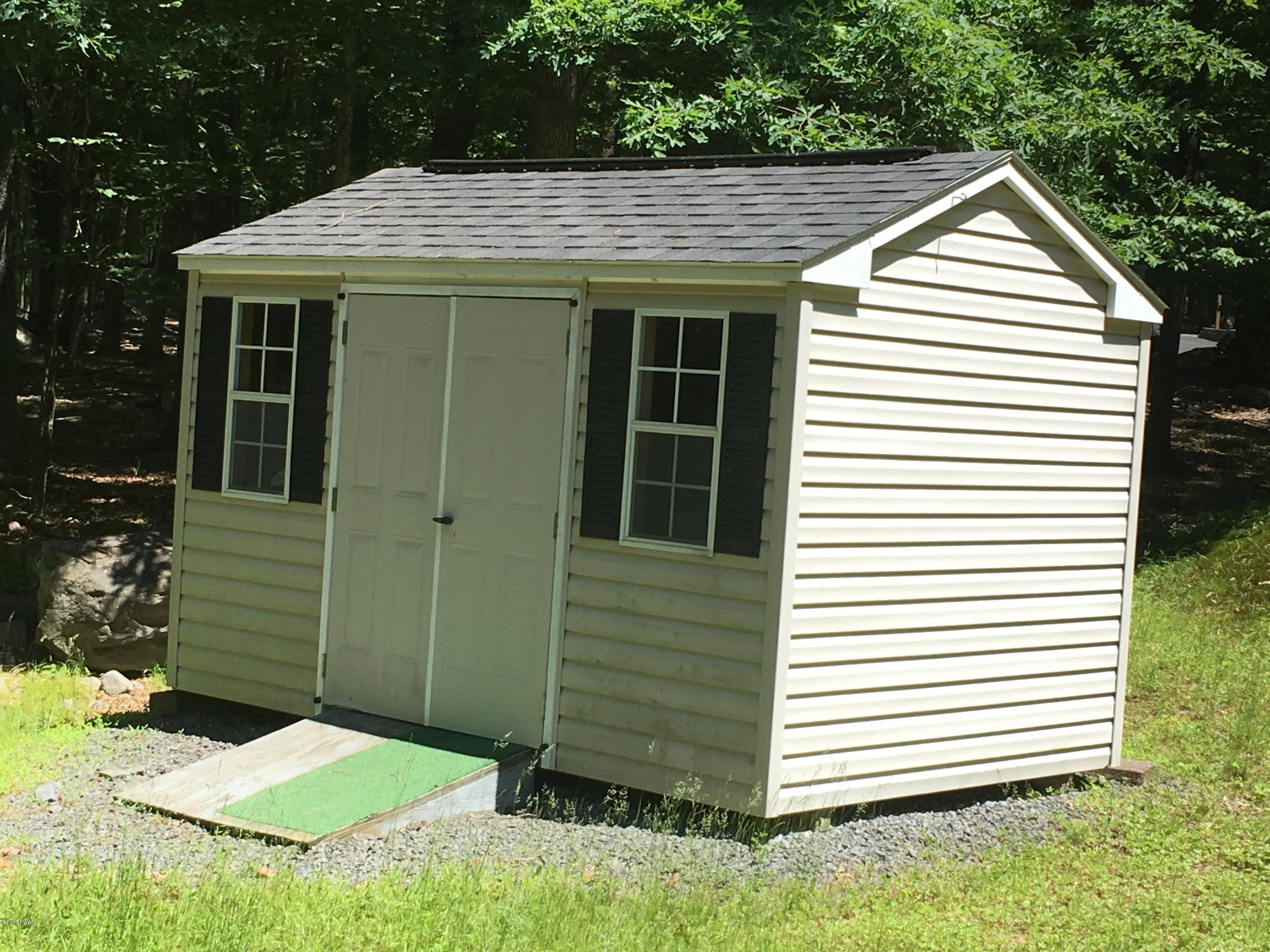 154 Butternut Road Milford, PA 18337 - Photo 14 of 14 a front view of a house with a yard