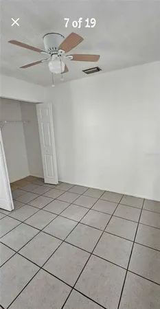 a view of a room and fan