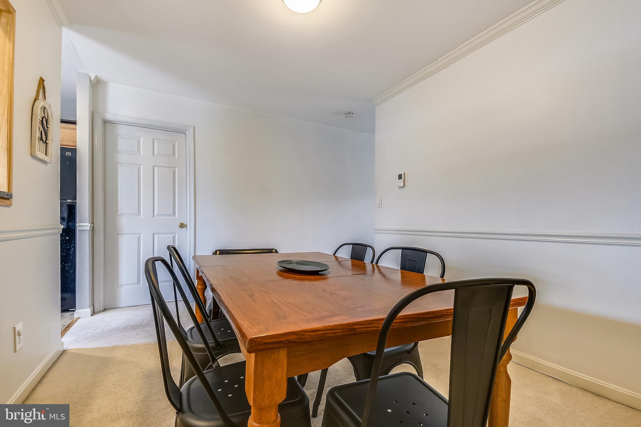 1081 Downton Road Halethorpe, MD 21227 - Photo 15 of 36 a view of a dining room with furniture and window