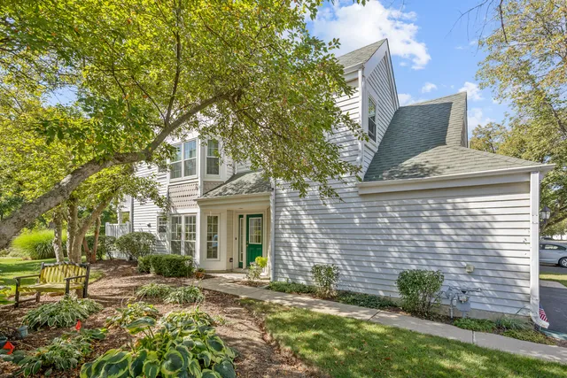 a view of house with yard