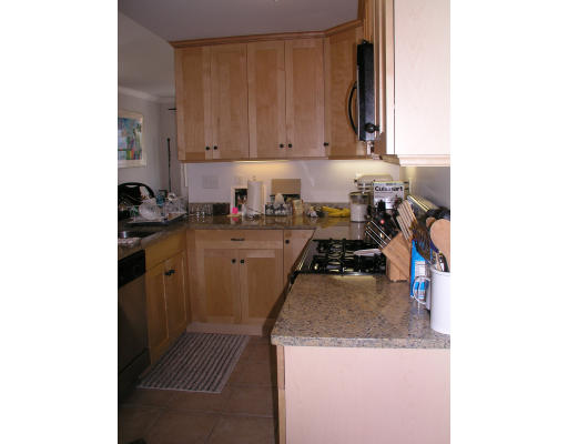 21 Harris Street, Unit 2 Somerville, MA 02140 - Photo 7 of 13 a kitchen with a sink and cabinets