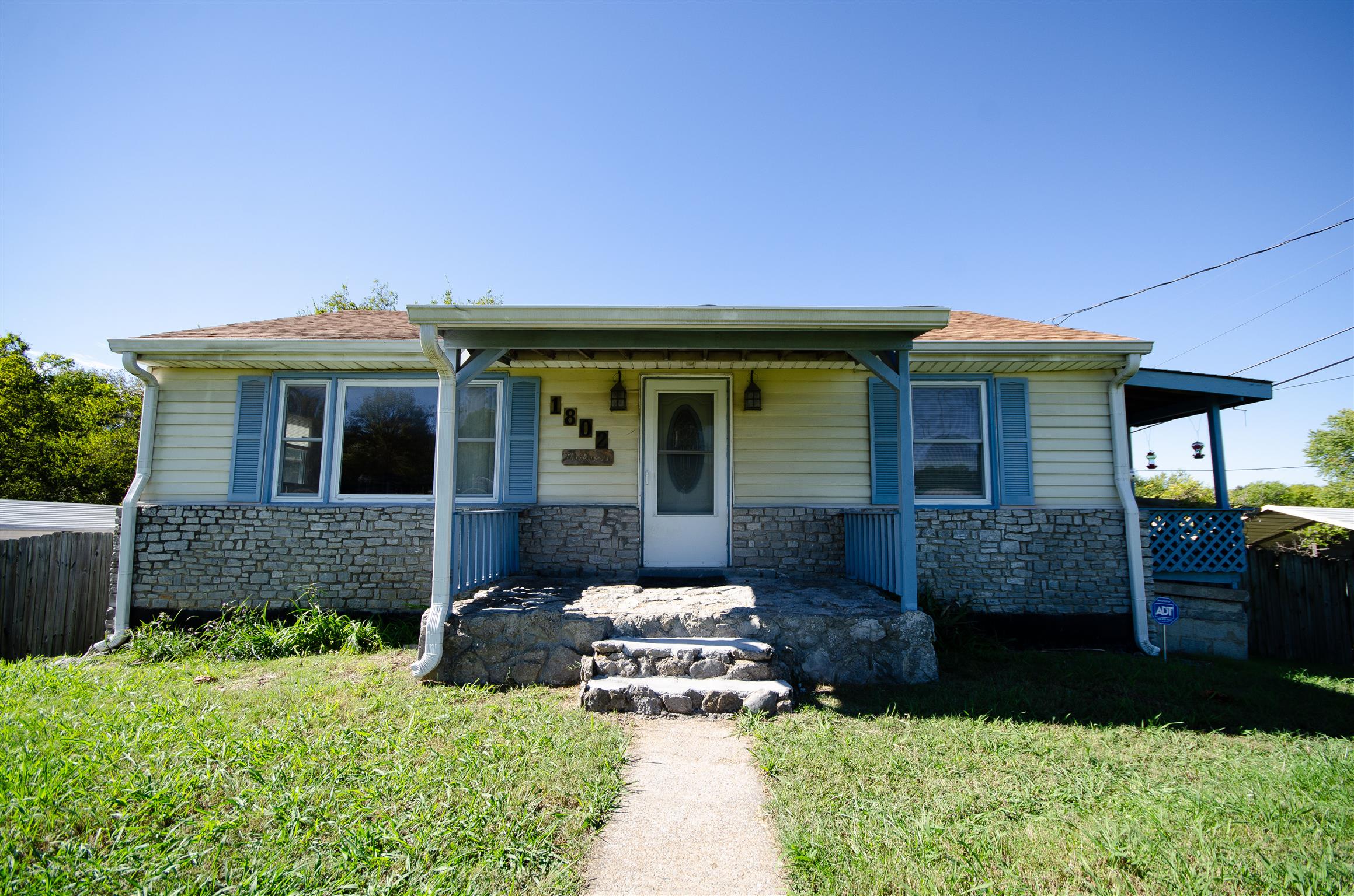 1802 Murfreesboro Road Lebanon, TN 37090 - Photo 1 of 23 a front view of a house with a garden