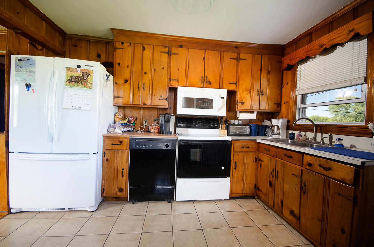 1802 Murfreesboro Road Lebanon, TN 37090 - Photo 6 of 23 a kitchen with stainless steel appliances a refrigerator sink and cabinets