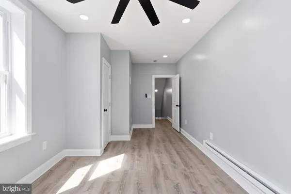 a view of an empty room and window