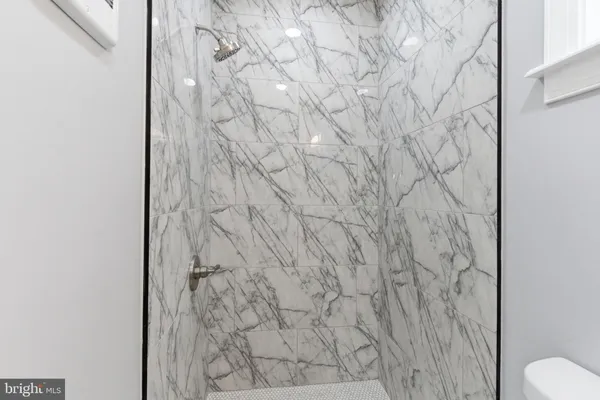 a bathroom with a shower curtain