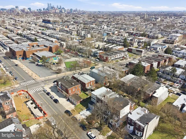 an aerial view of a city with lots of residential buildings