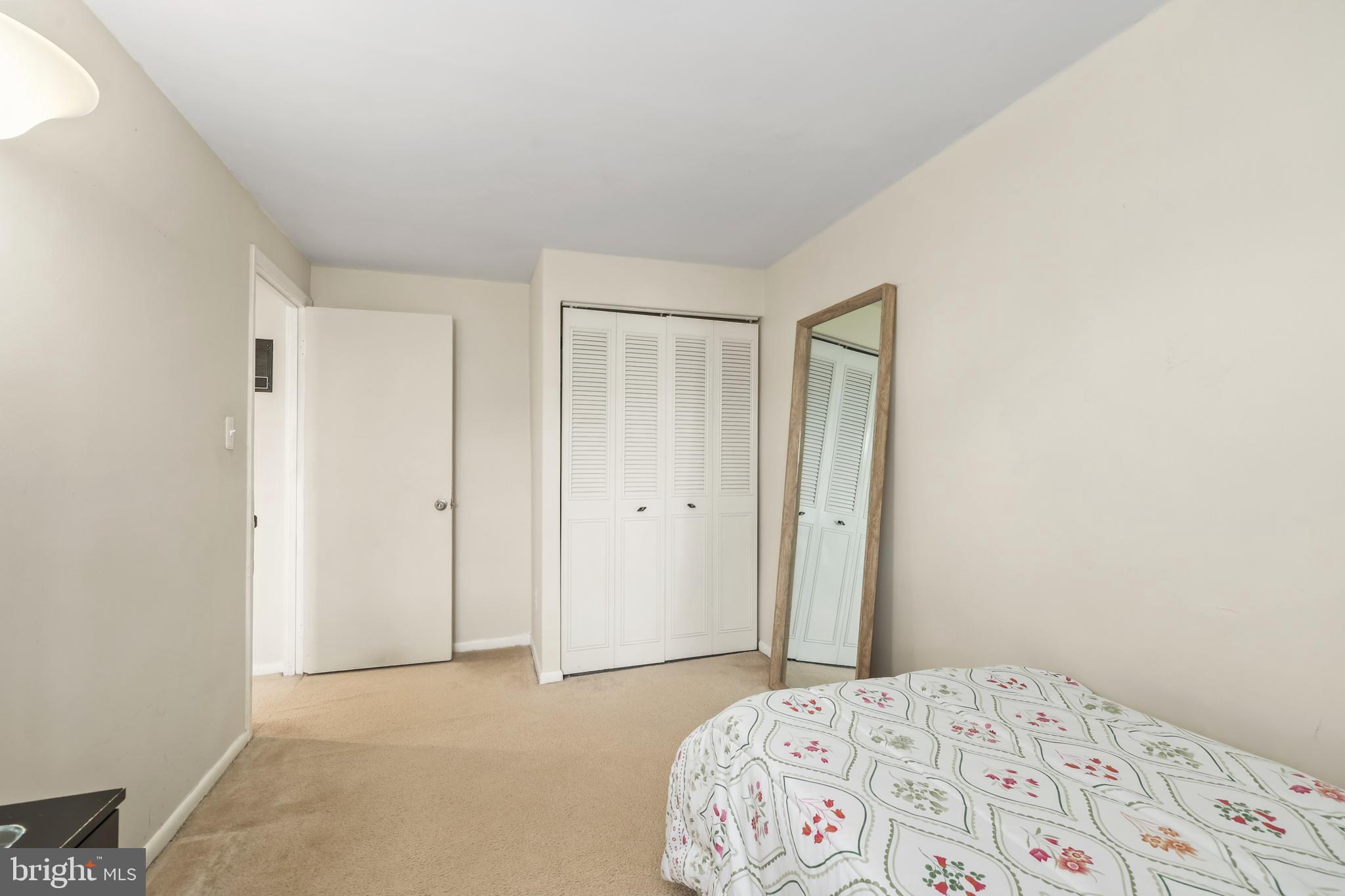 302 Giles Place Sterling, VA 20164 - Photo 13 of 23 a bedroom with a bed and a window