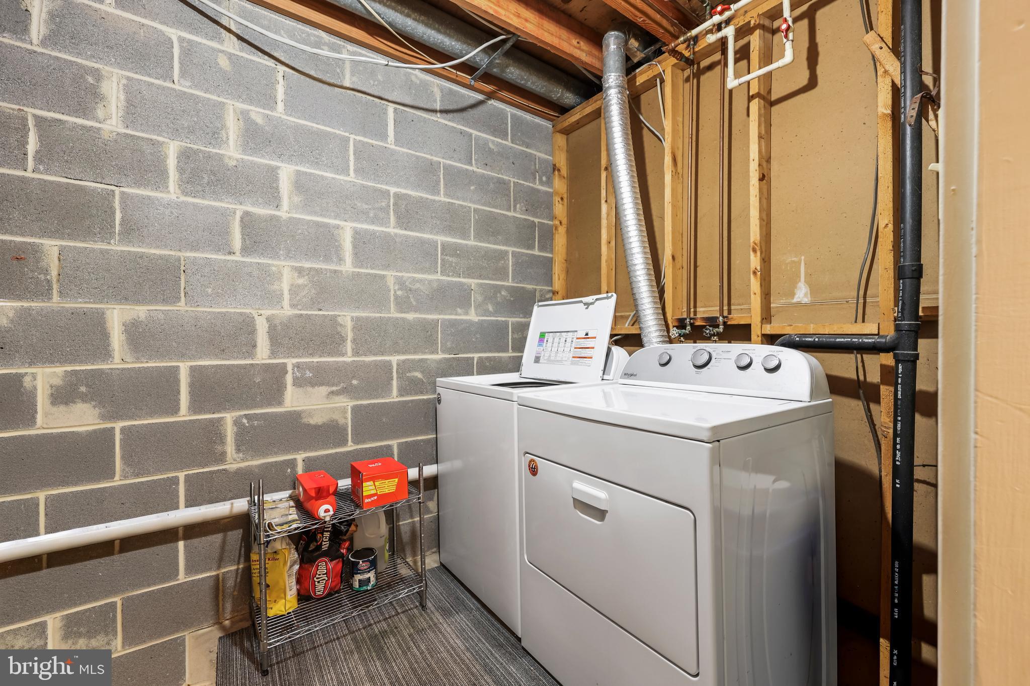 302 Giles Place Sterling, VA 20164 - Photo 16 of 23 a utility room with dryer and washer