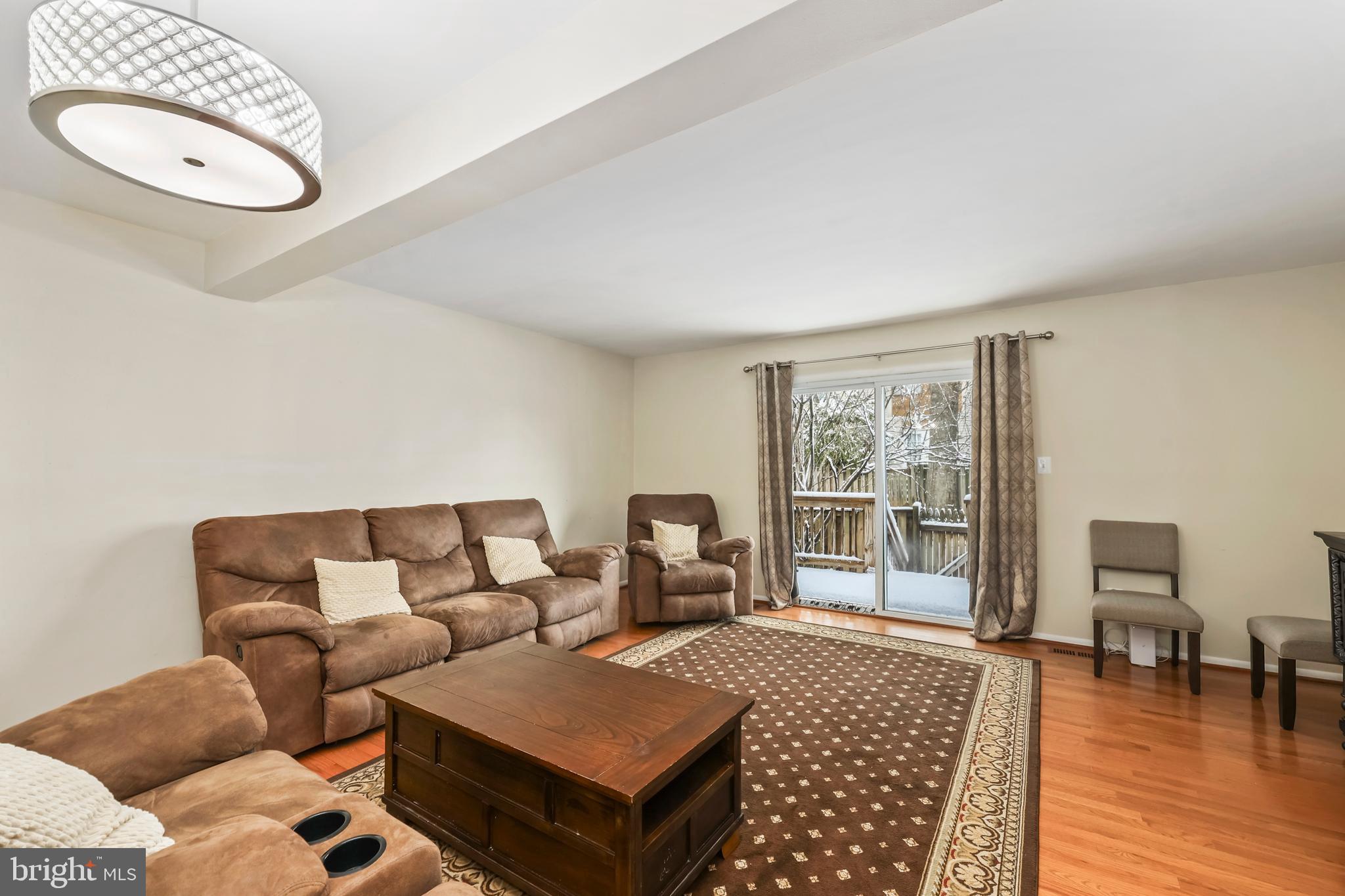 302 Giles Place Sterling, VA 20164 - Photo 19 of 23 a living room with furniture and a window