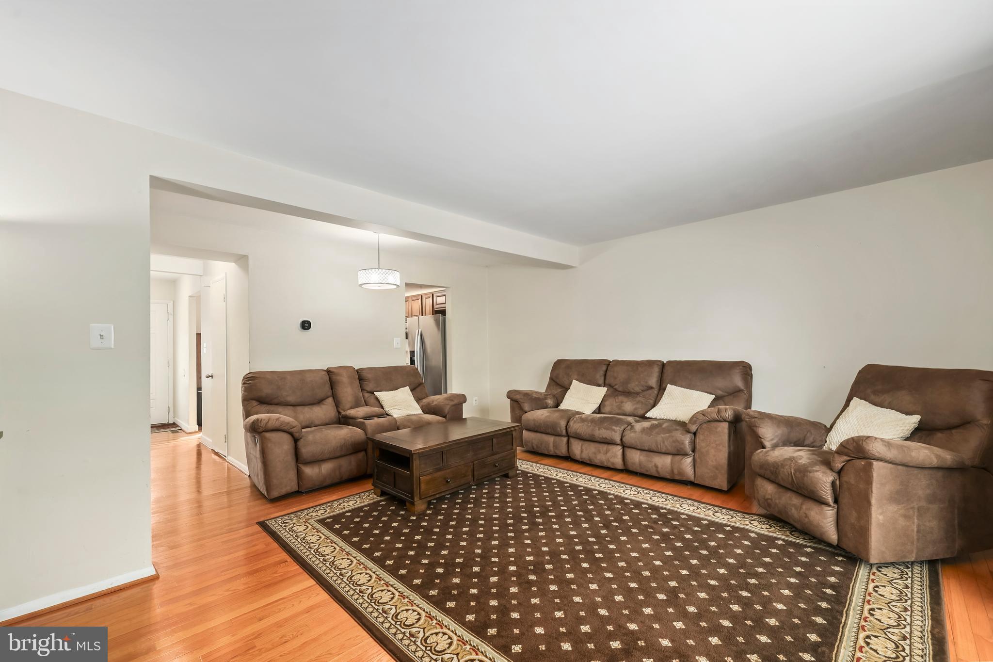 302 Giles Place Sterling, VA 20164 - Photo 21 of 23 a living room with furniture rug and couch
