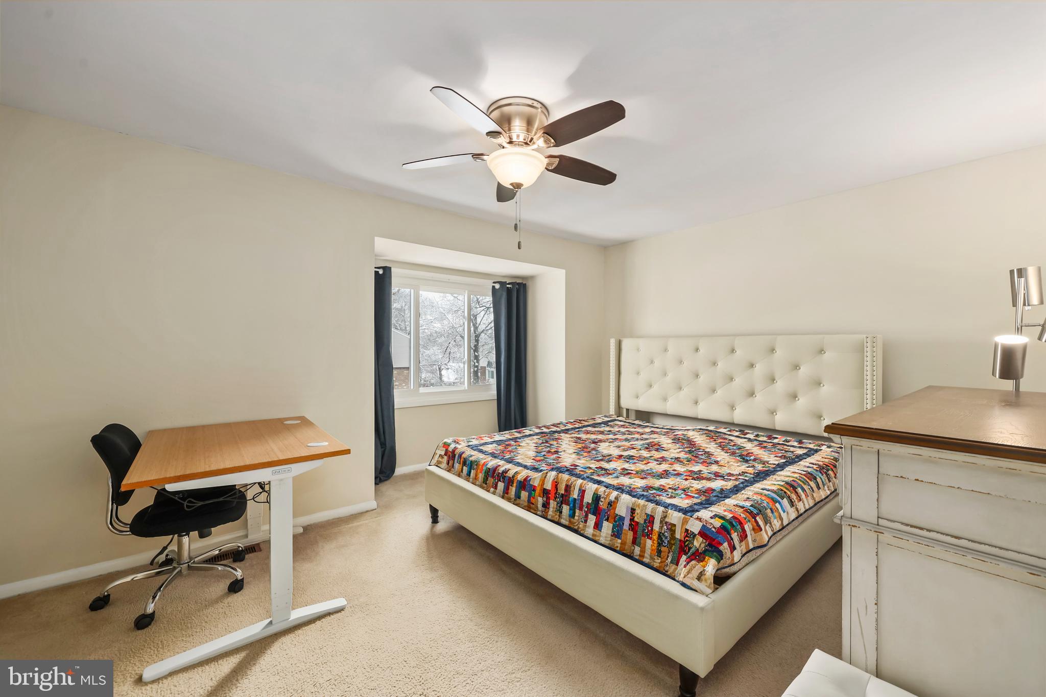 302 Giles Place Sterling, VA 20164 - Photo 6 of 23 a bedroom with a bed and a chandelier