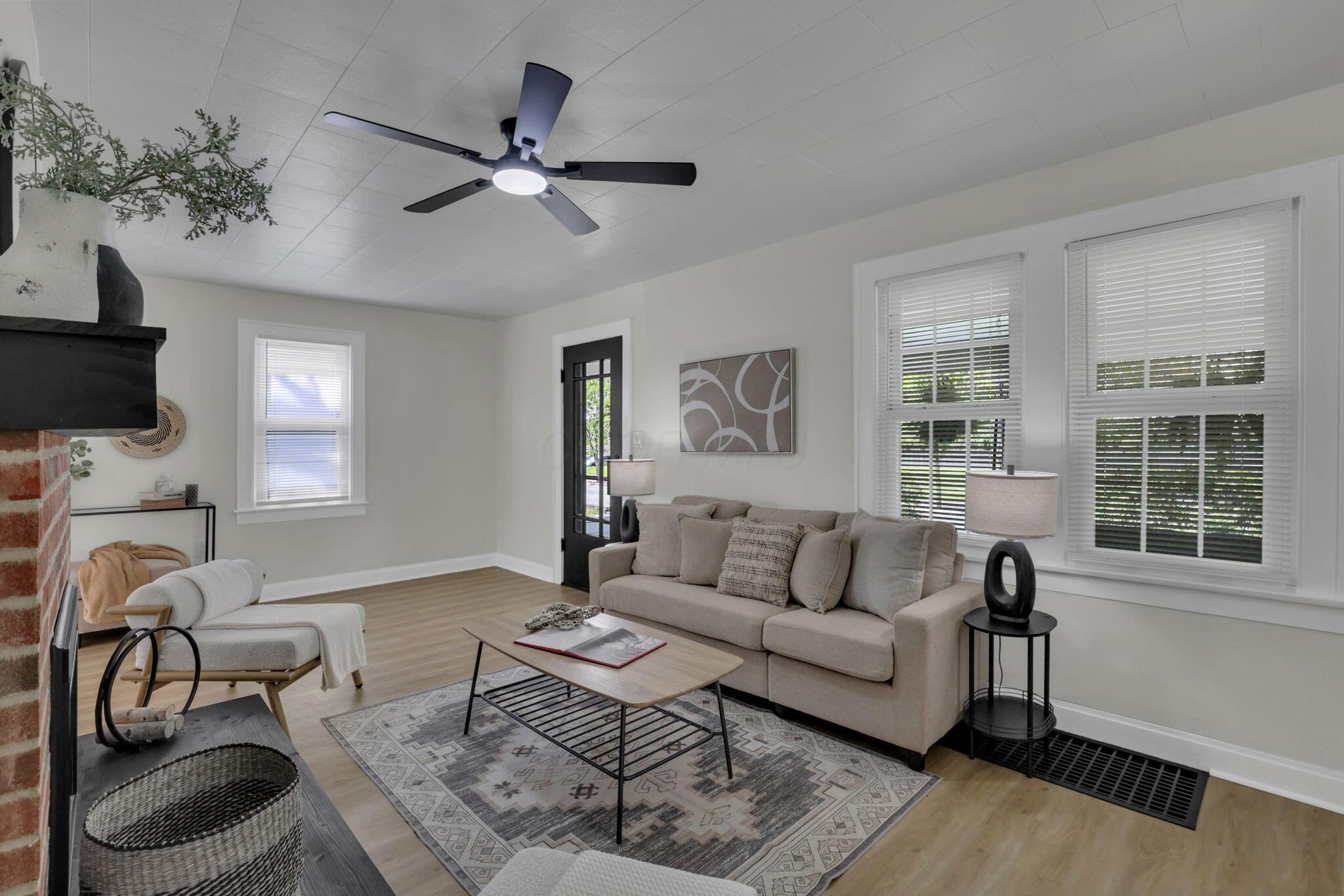 800 South Yearling Road Columbus, OH 43213 - Photo 11 of 57 Living room, complete with new windows, new flooring and fresh coat of paint.