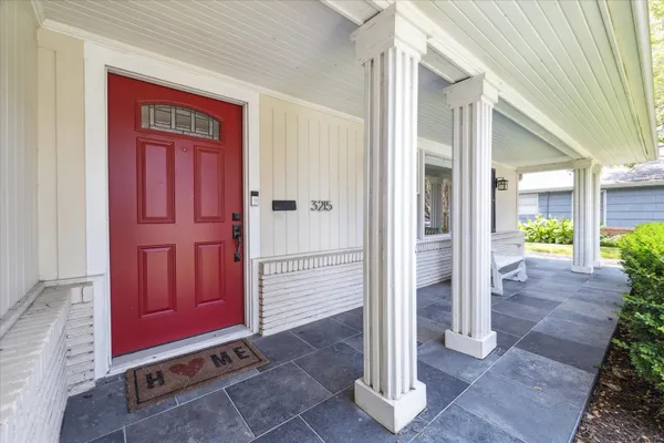 a view of a red door of the house