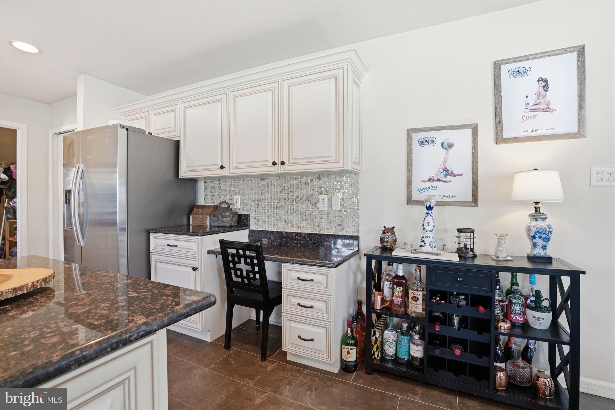 36 Moray Lane Sewell, NJ 08080 - Photo 13 of 40 a kitchen with stainless steel appliances granite countertop a stove refrigerator and cabinets