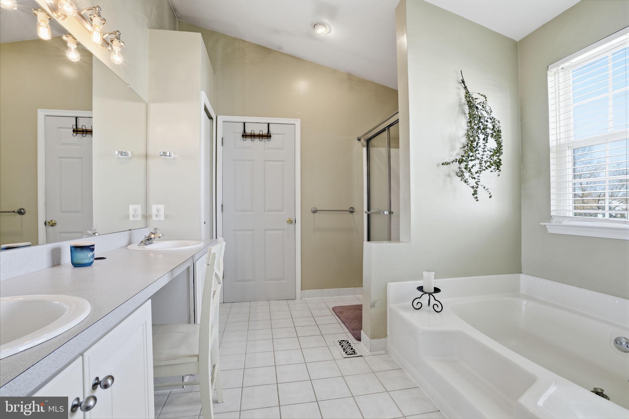 36 Moray Lane Sewell, NJ 08080 - Photo 21 of 40 a bathroom with a tub sink and mirror
