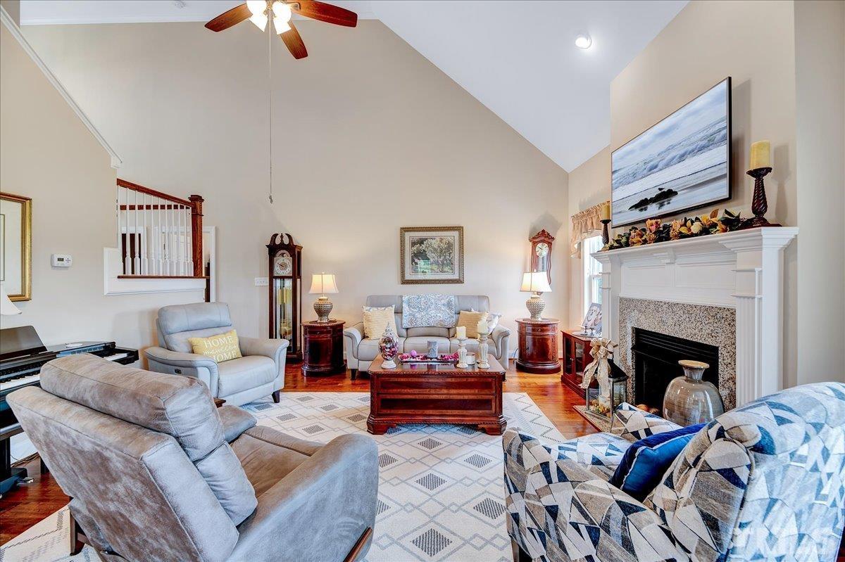 97 Baldwin Ridge Court Willow Spring, NC 27592 - Photo 17 of 46 a living room with furniture fireplace and window