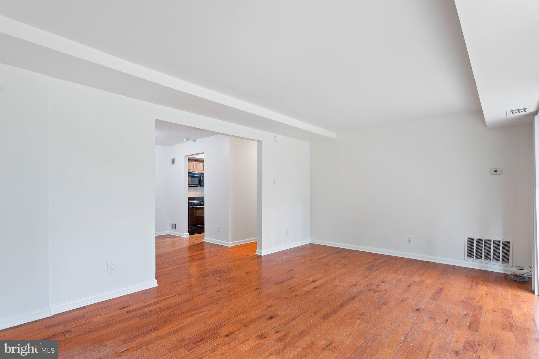 11611 Vantage Hill Road, Unit 1A Reston, VA 20190 - Photo 11 of 22 Living Room