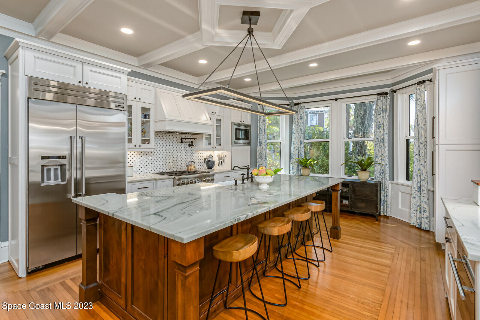 709 Rockledge Drive Rockledge, FL 32955 - Photo 17 of 102 a kitchen with stainless steel appliances granite countertop a sink a stove and a refrigerator