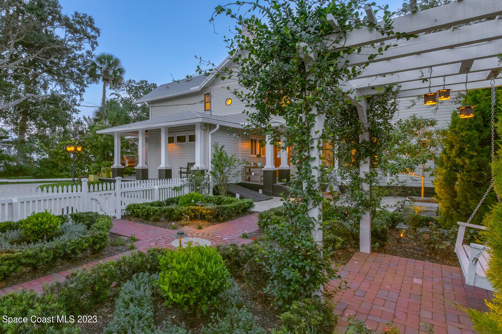 709 Rockledge Drive Rockledge, FL 32955 - Photo 60 of 102 a front view of a house with garden