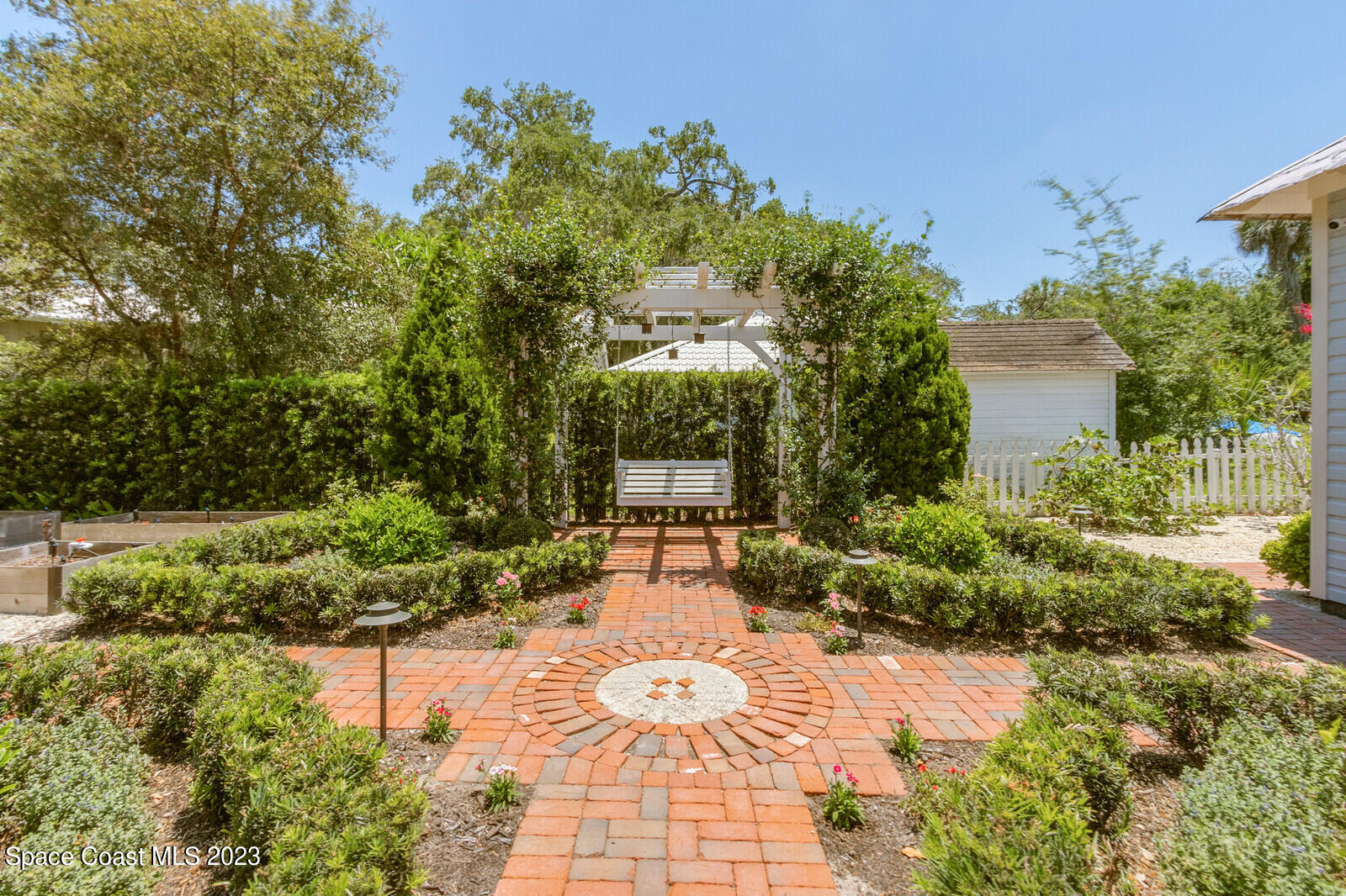 709 Rockledge Drive Rockledge, FL 32955 - Photo 61 of 102 a backyard of a house with yard and outdoor seating