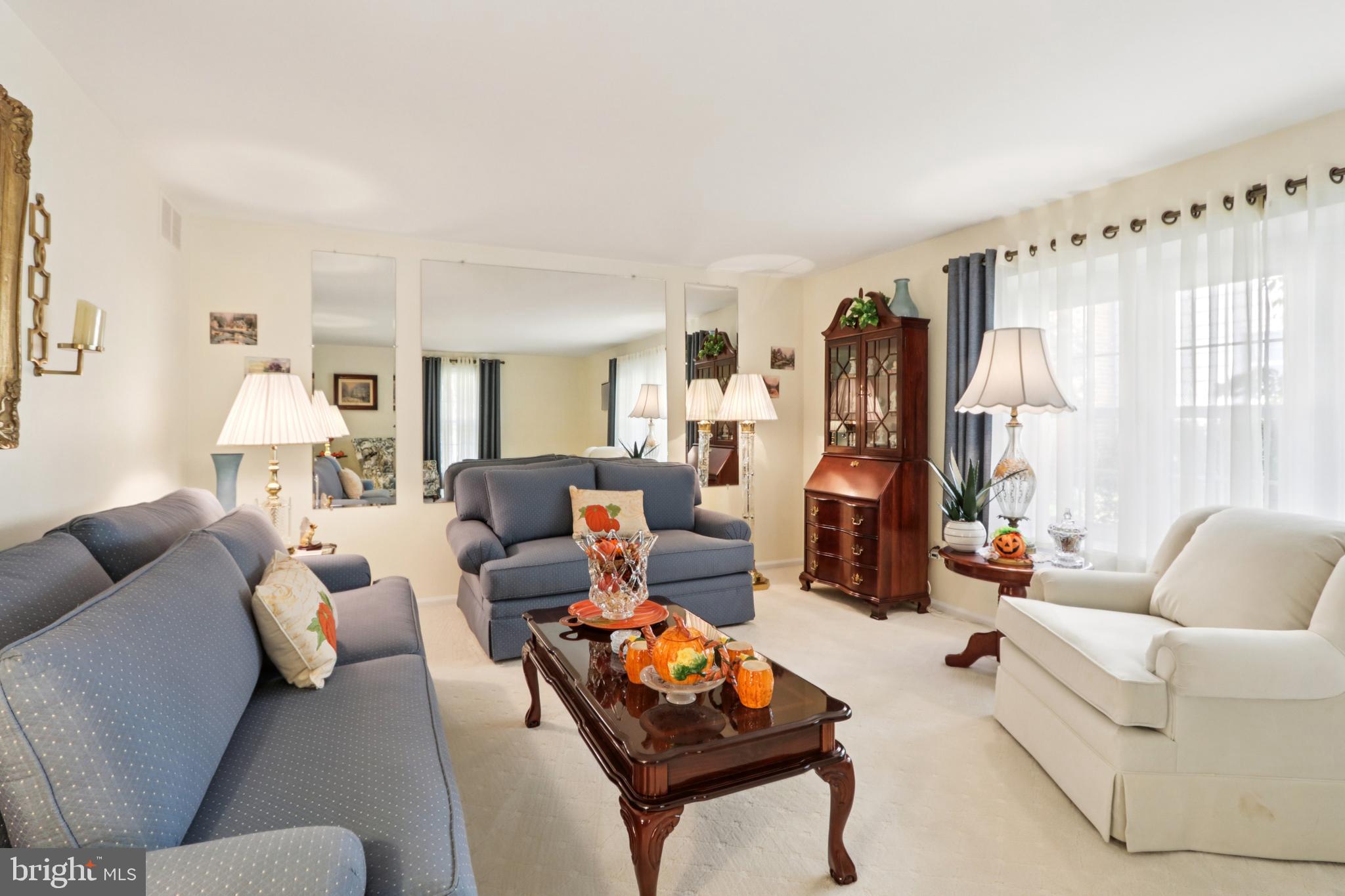 102 Partree Road Cherry Hill, NJ 08003 - Photo 12 of 87 a living room with furniture and a large window