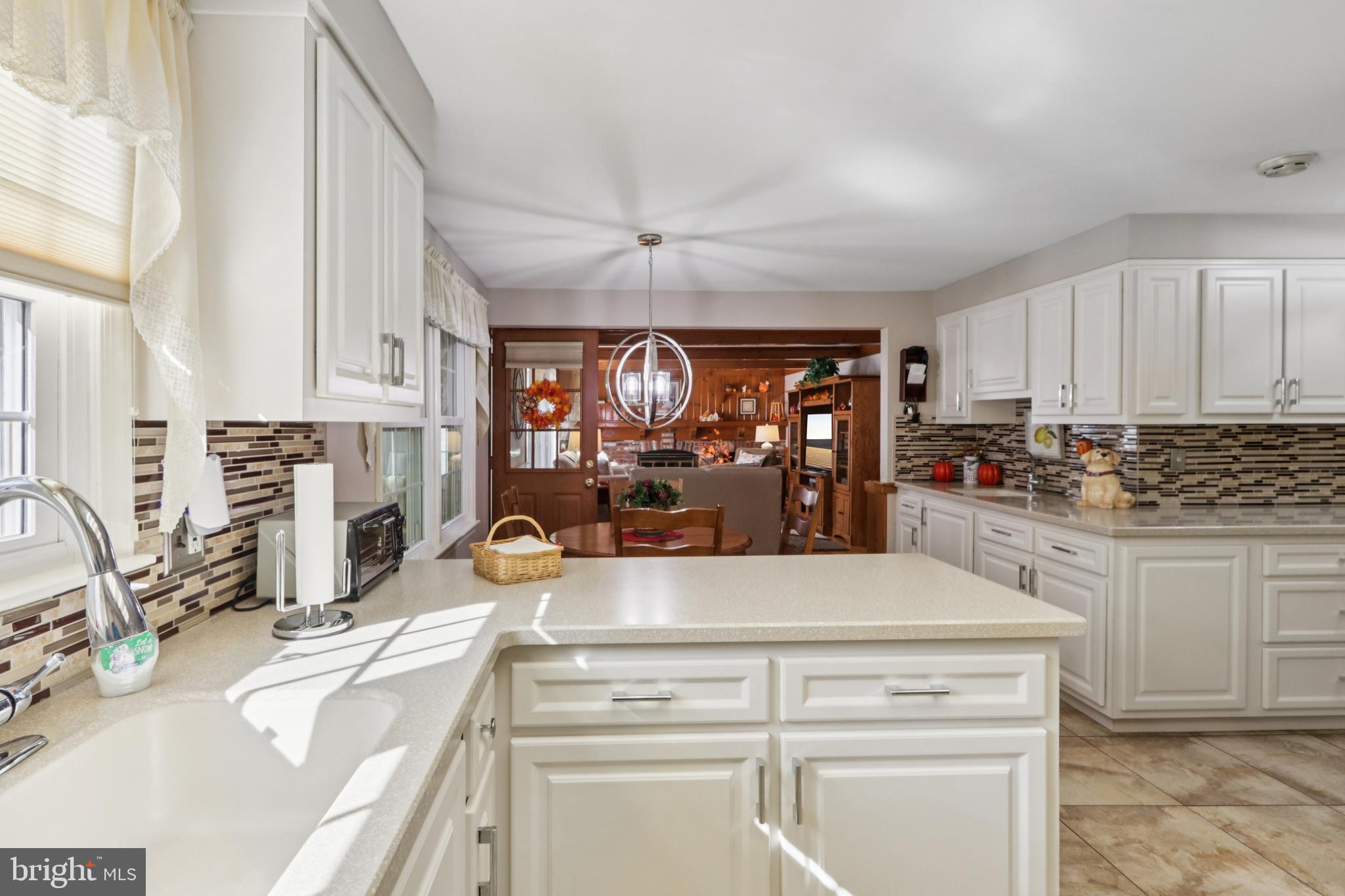 102 Partree Road Cherry Hill, NJ 08003 - Photo 27 of 87 a view of living room with granite countertop furniture and a fireplace