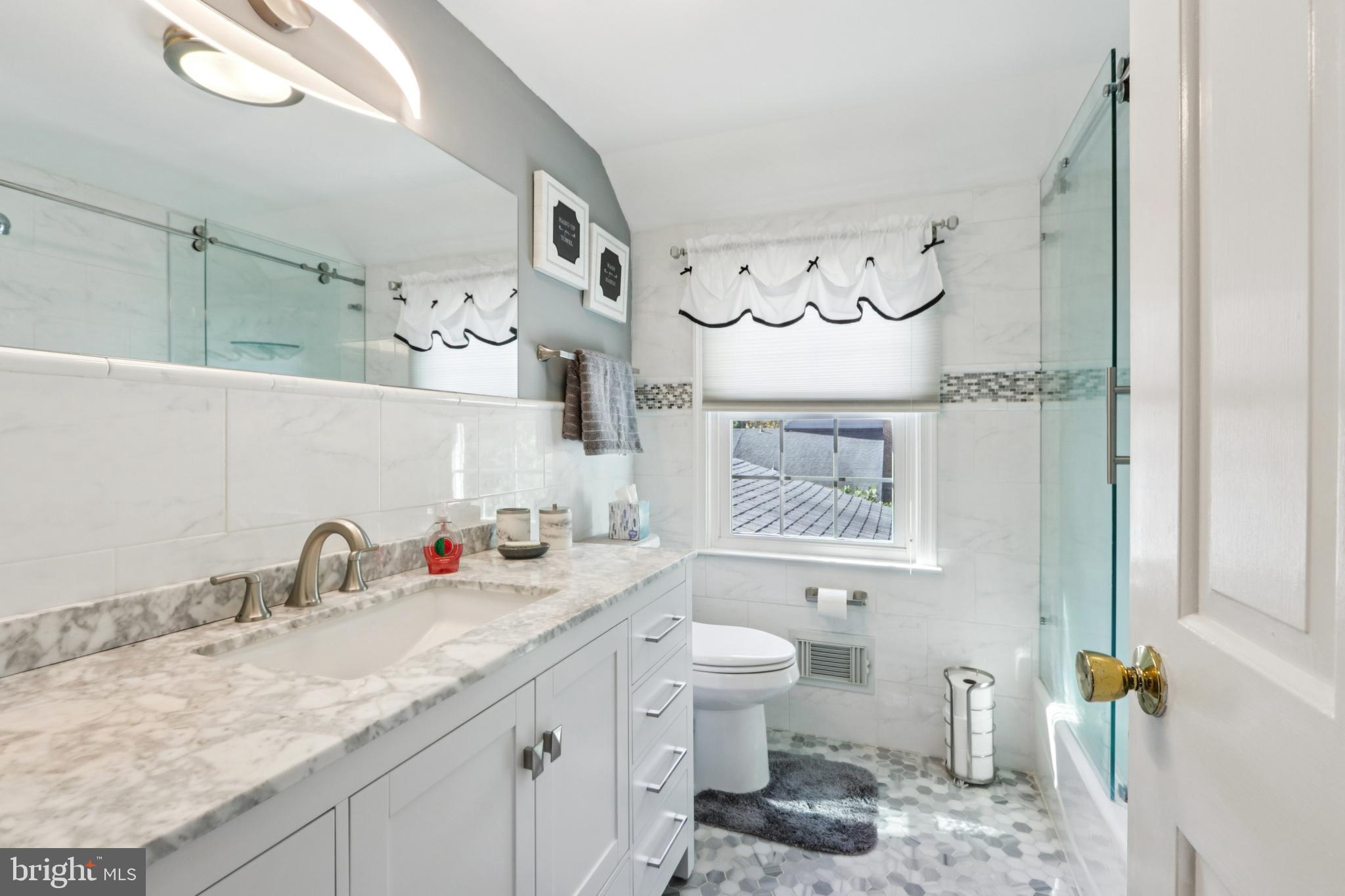 102 Partree Road Cherry Hill, NJ 08003 - Photo 35 of 87 a bathroom with a granite countertop sink mirror vanity and toilet