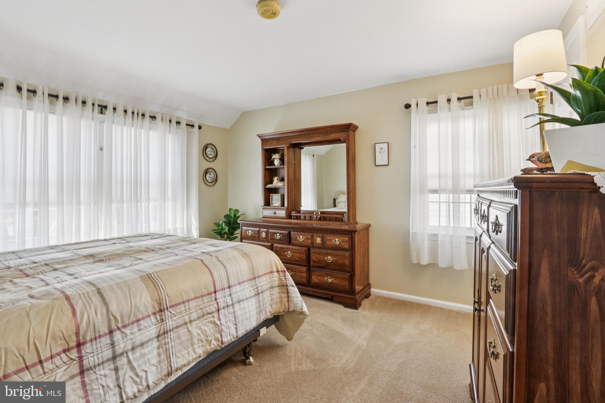 102 Partree Road Cherry Hill, NJ 08003 - Photo 36 of 87 a bedroom with a bed and a dresser