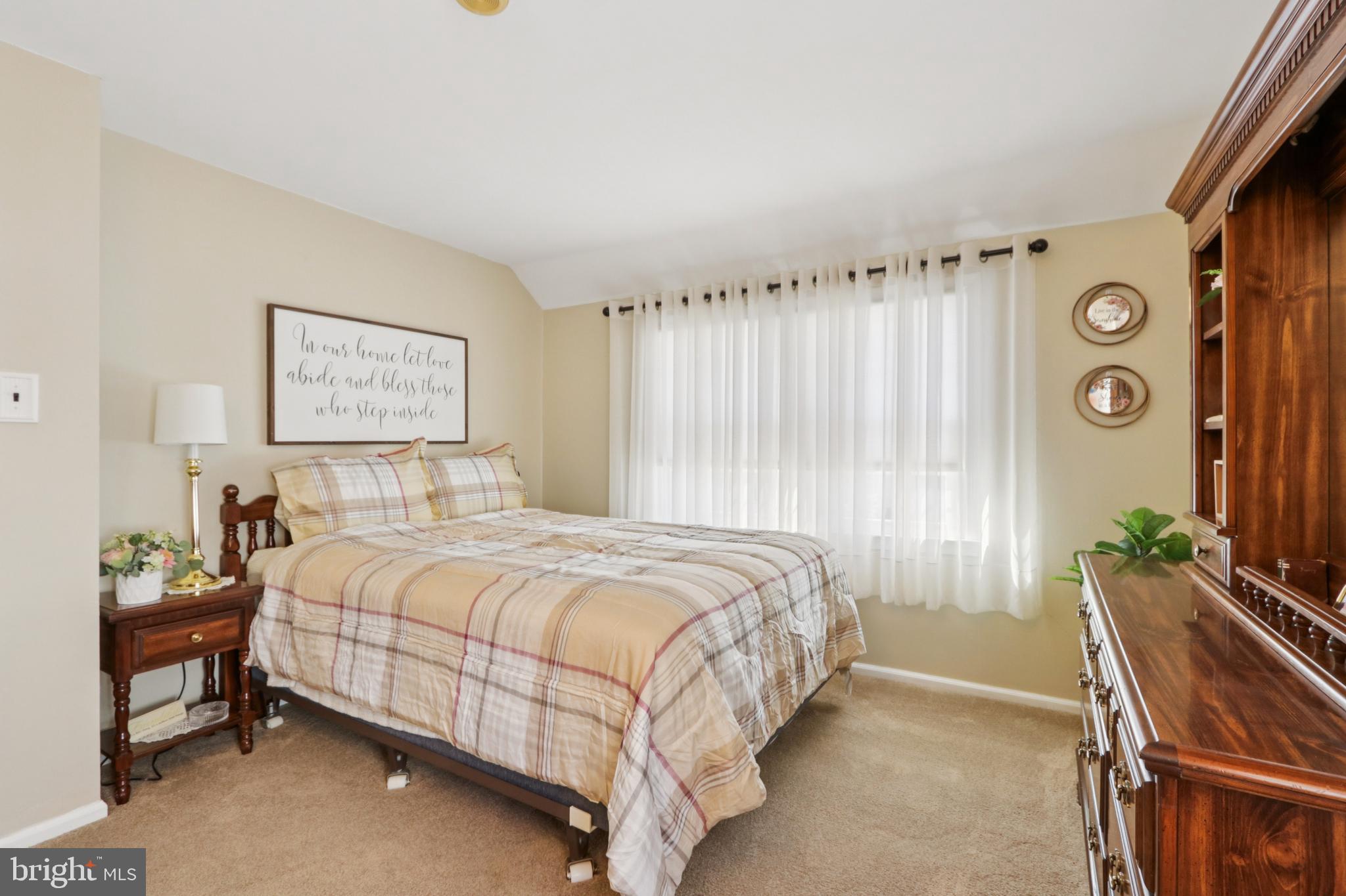 102 Partree Road Cherry Hill, NJ 08003 - Photo 37 of 87 a bedroom with a bed and a chandelier
