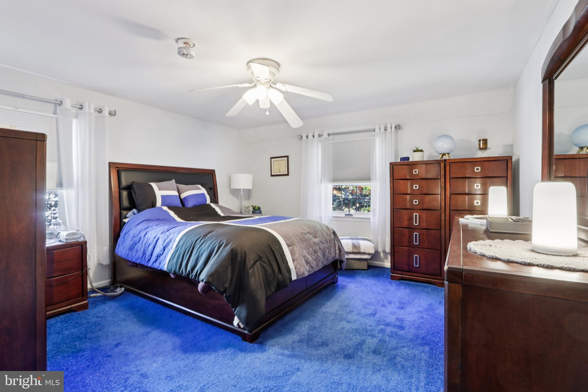 102 Partree Road Cherry Hill, NJ 08003 - Photo 39 of 87 a spacious bedroom with a bed and wooden floor