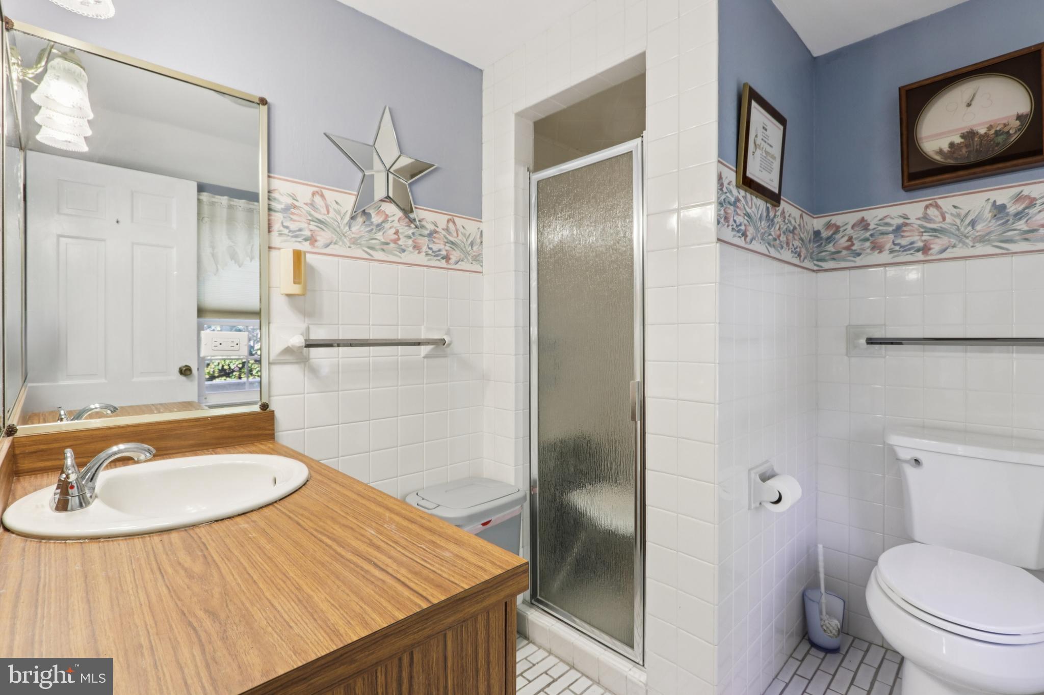 102 Partree Road Cherry Hill, NJ 08003 - Photo 45 of 87 a bathroom with a sink a toilet and shower